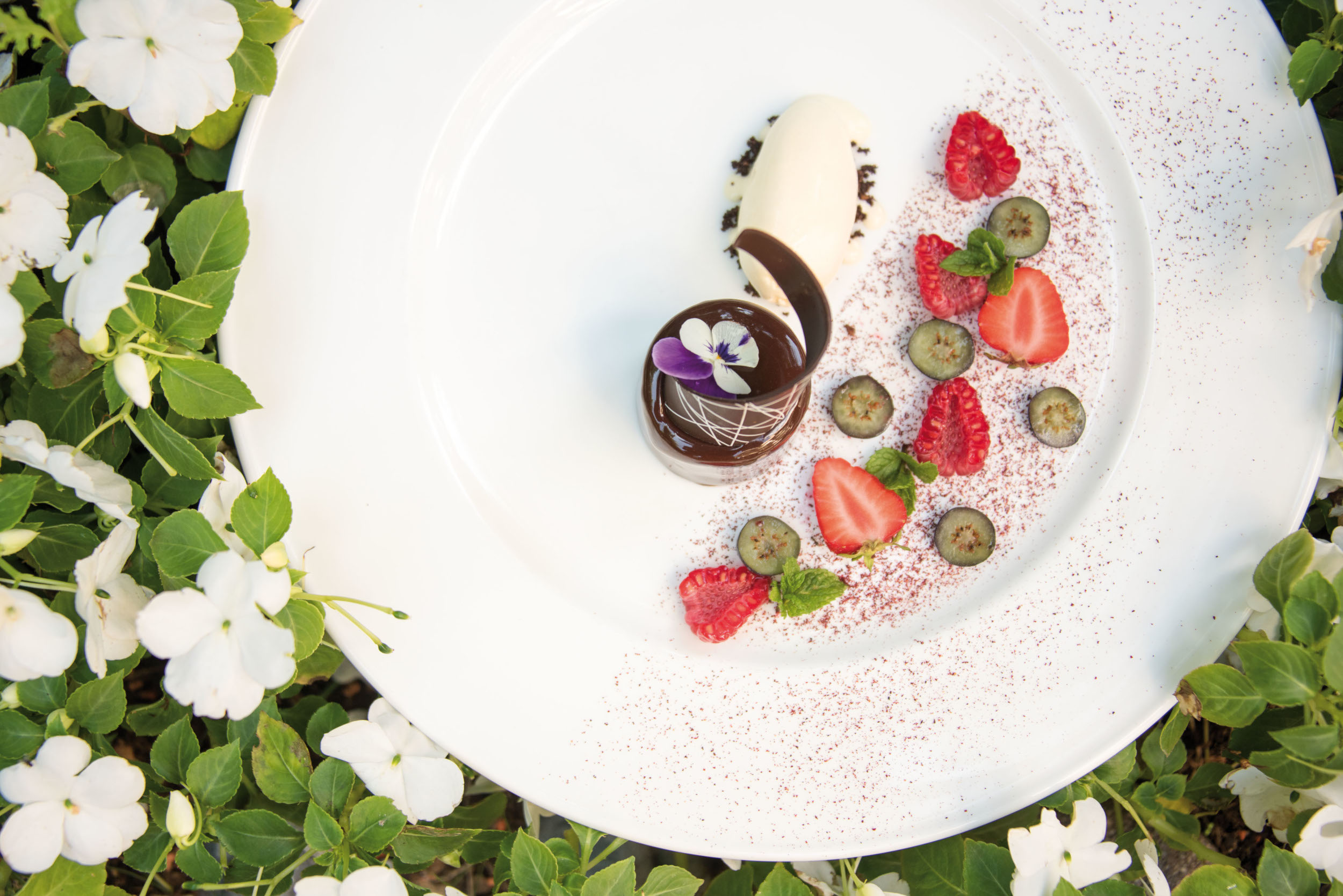 Gourmetgericht im Hotel Vier Jahreszeiten Südtirol – kulinarische Spezialität auf elegantem Teller